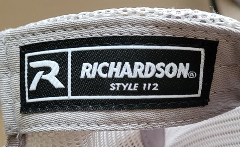 Close-up of a Richardson brand label on a textured surface