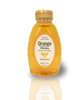 Bottle of orange blossom honey on a white background