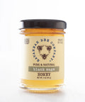 Jar of Savannah Bee Company black sage honey on a white background