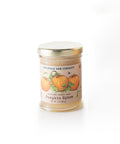 Jar of Savannah Bee Company whipped honey with pumpkin spice on a white background