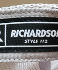 Close-up of a Richardson brand label on a textured surface