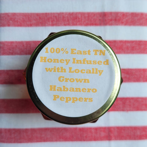 


Habanero pepper jar with text on a red and white striped background