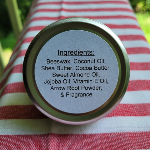 Jar lid with ingredients list on a red and white striped fabric background