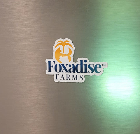 Foxadise Farms logo on a metallic surface