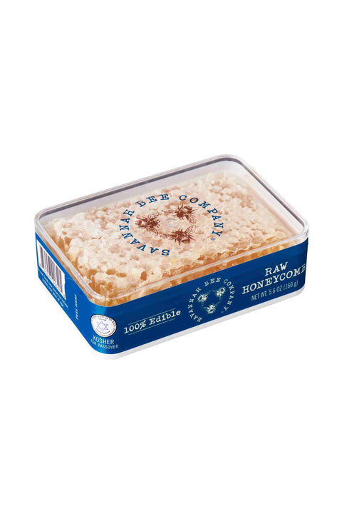 A blue tin container of raw honeycomb, with the label showing the brand 'Kingsway' and the product name 'Raw Honeycomb'.