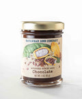 A jar of whipped honey with chocolate by Savannah Bee Company